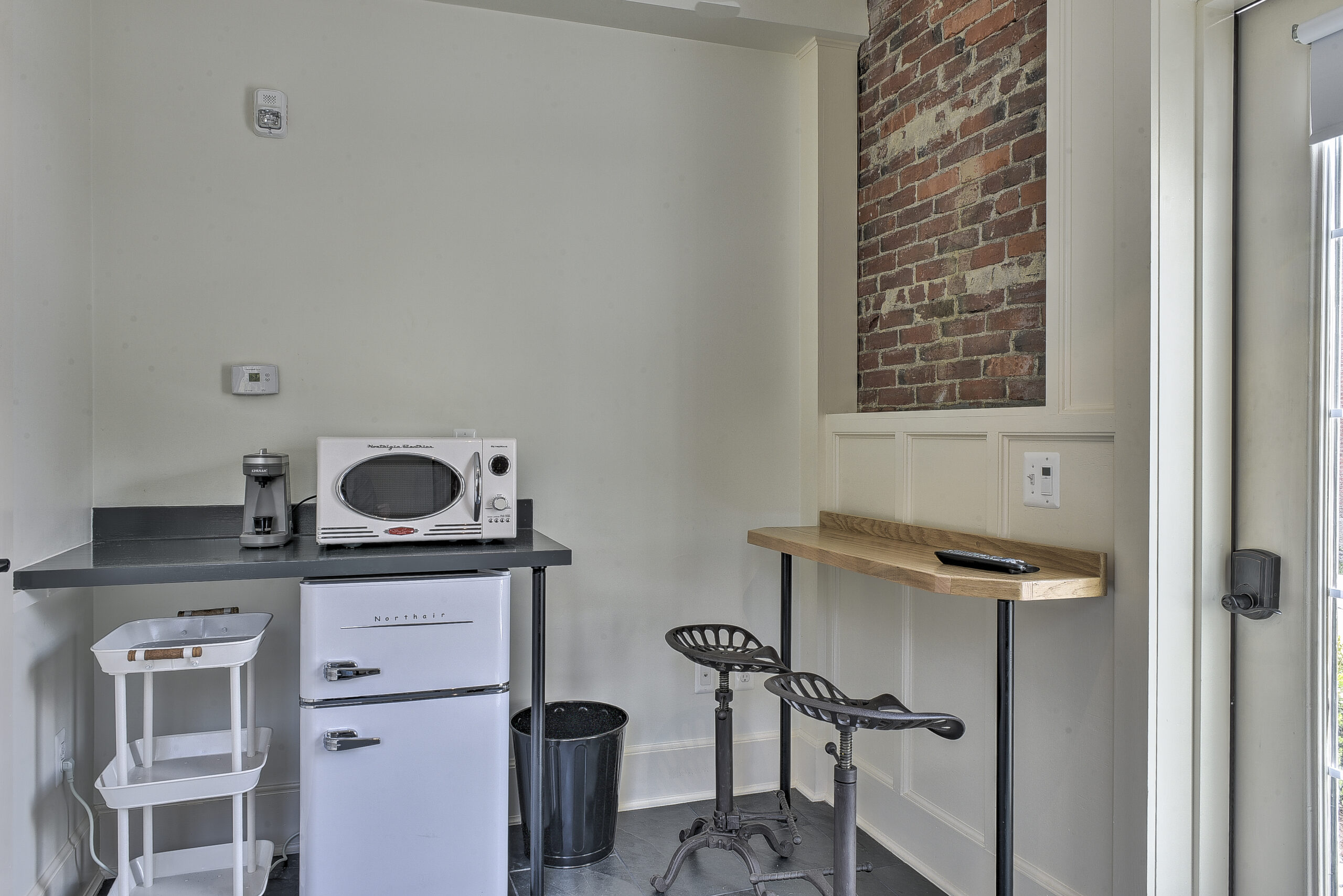 The Oak Room breakfast bar and kitchenette at The Burrell House
